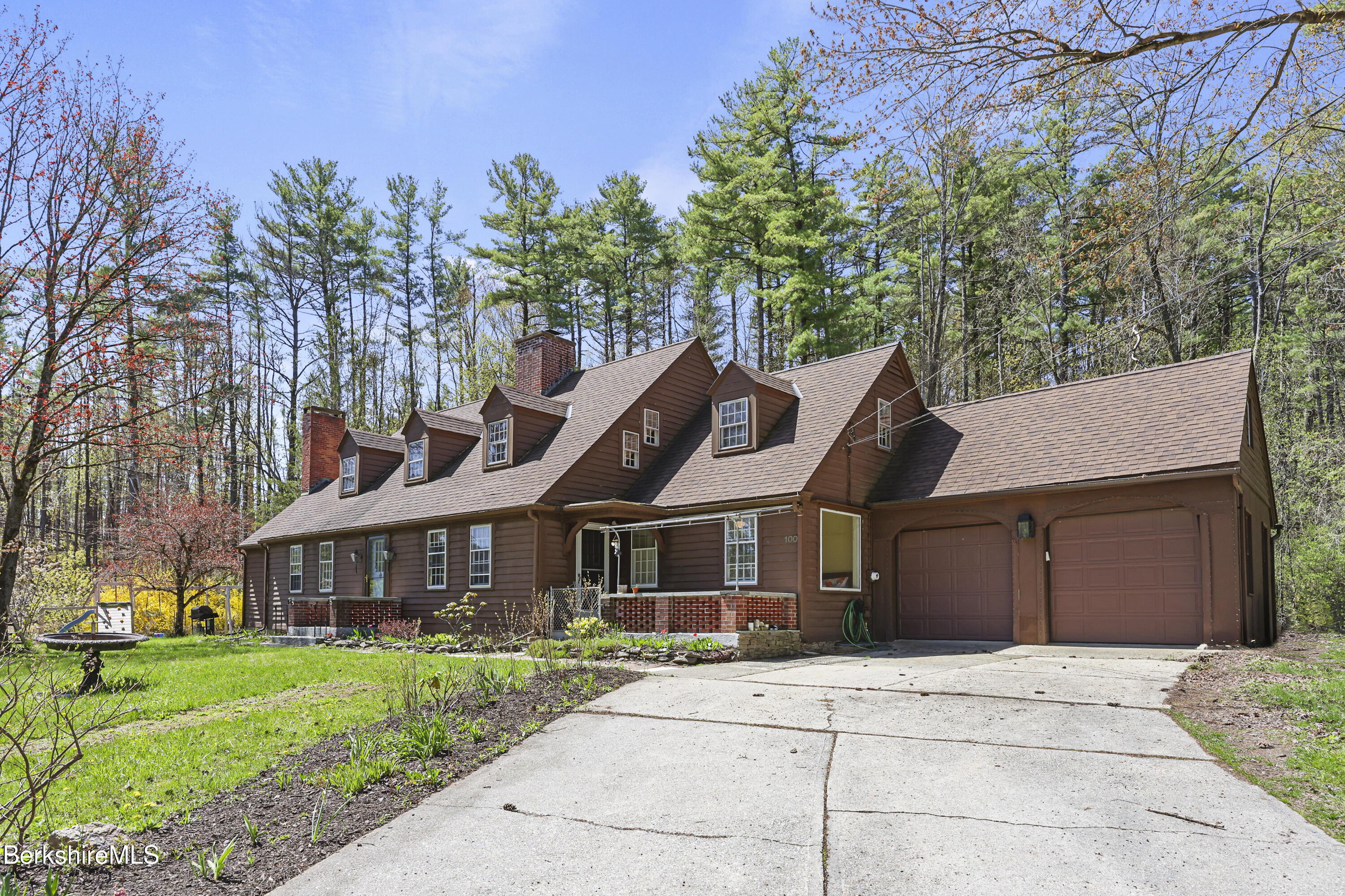 100 South Prospect Street Lee, MA 01238 - Photo 37 of 39 a front view of a house with a garden
