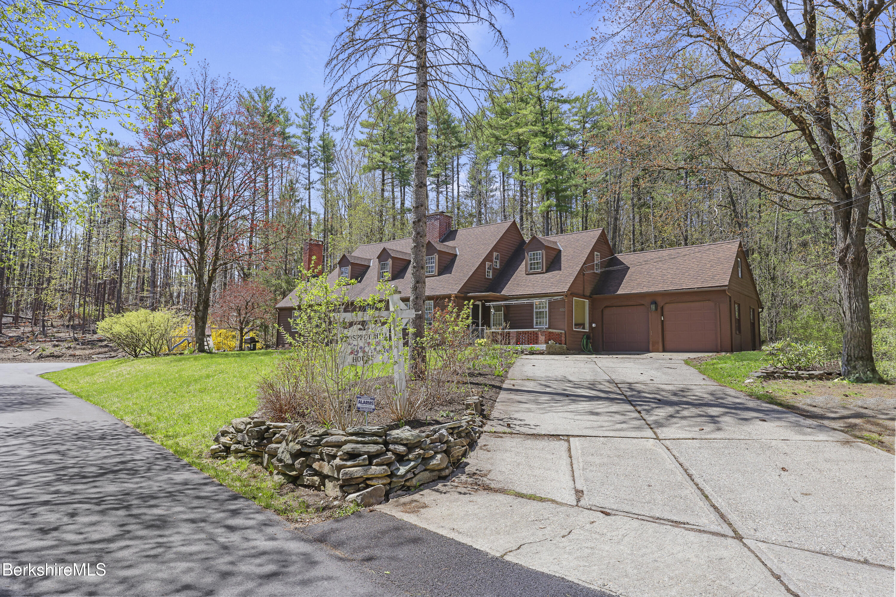 100 South Prospect Street Lee, MA 01238 - Photo 39 of 39 a front view of a house with garden