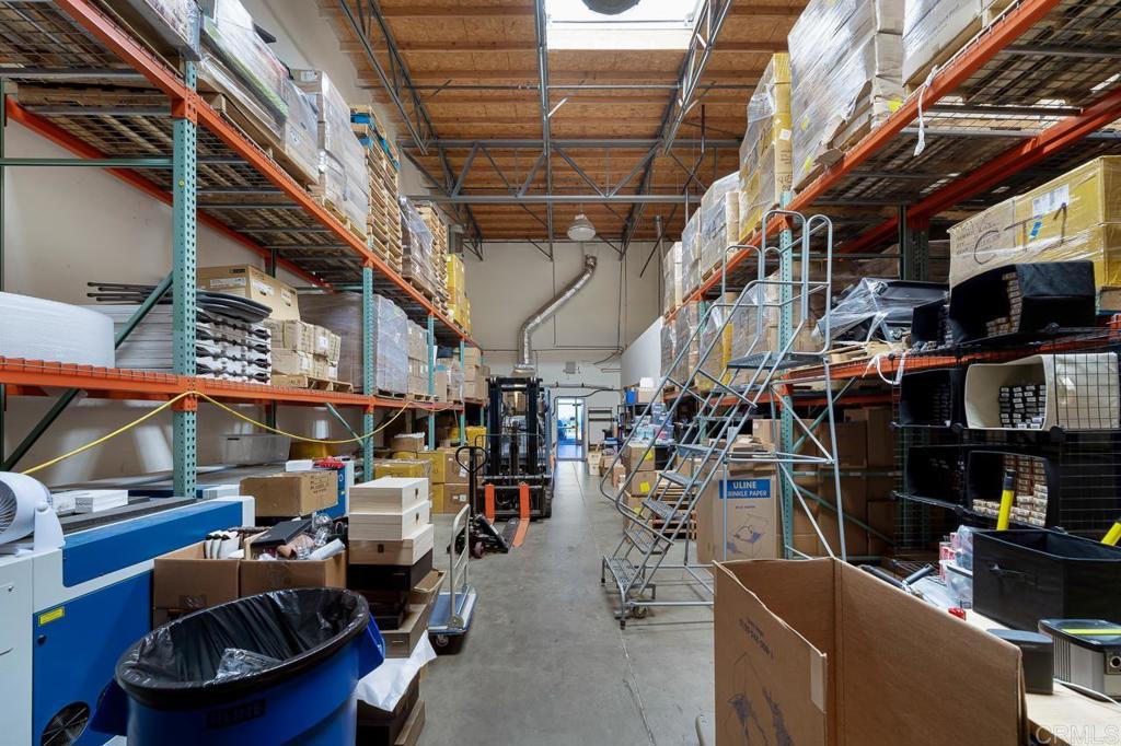 859 Bowsprit Road Chula Vista, CA 91914 - Photo 14 of 30 a view of a storage room with racks
