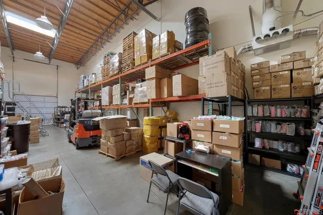 a room with furniture and a book shelf