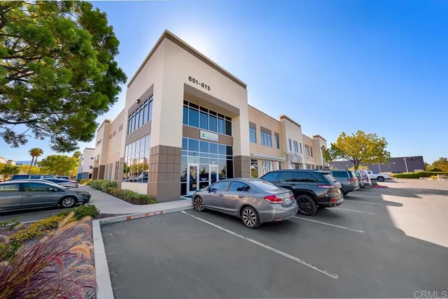 a view of a street with cars