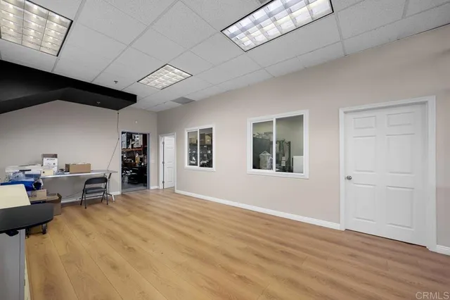 a view of livingroom with furniture and window
