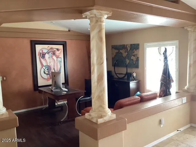 a living room with furniture and a window