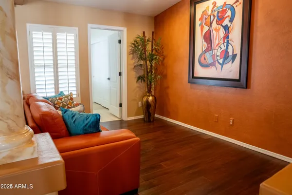a living room with furniture and a window