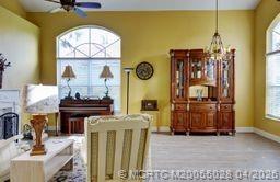 2120 Northwest Marsh Rabbit Lane Jensen Beach, FL 34957 - Photo 10 of 34 a living room with furniture and a window