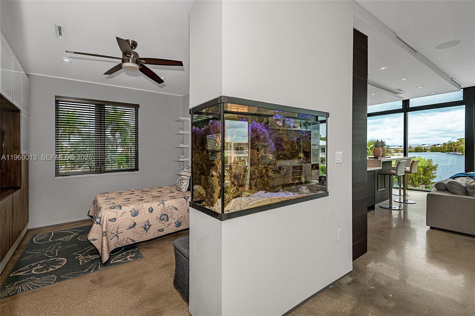 68 Mutiny Place Key Largo, FL 33037 - Photo 25 of 53 a bedroom with furniture and a window