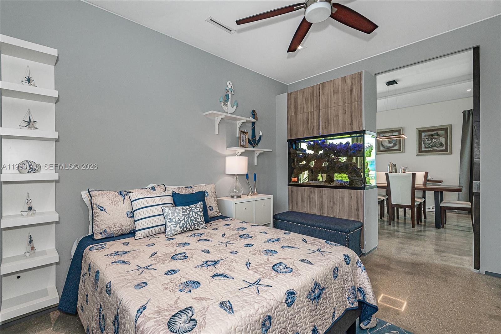 68 Mutiny Place Key Largo, FL 33037 - Photo 27 of 53 a bedroom with a large bed and a flat screen tv