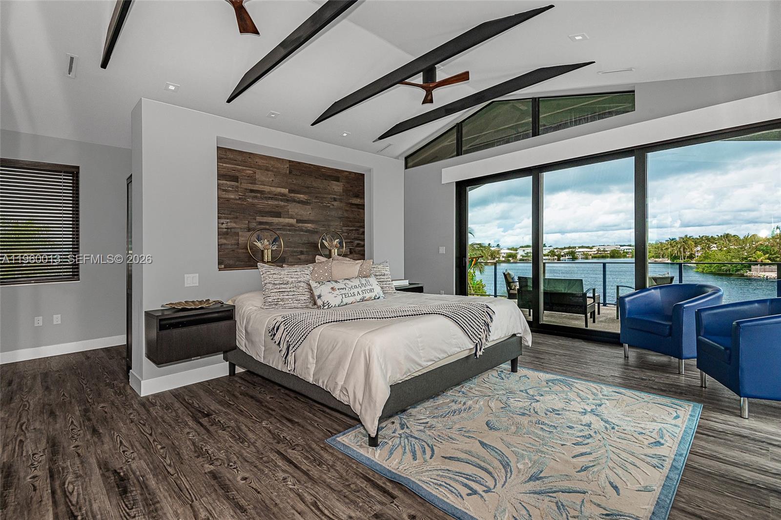 68 Mutiny Place Key Largo, FL 33037 - Photo 43 of 53 a bedroom with a large bed and a large window