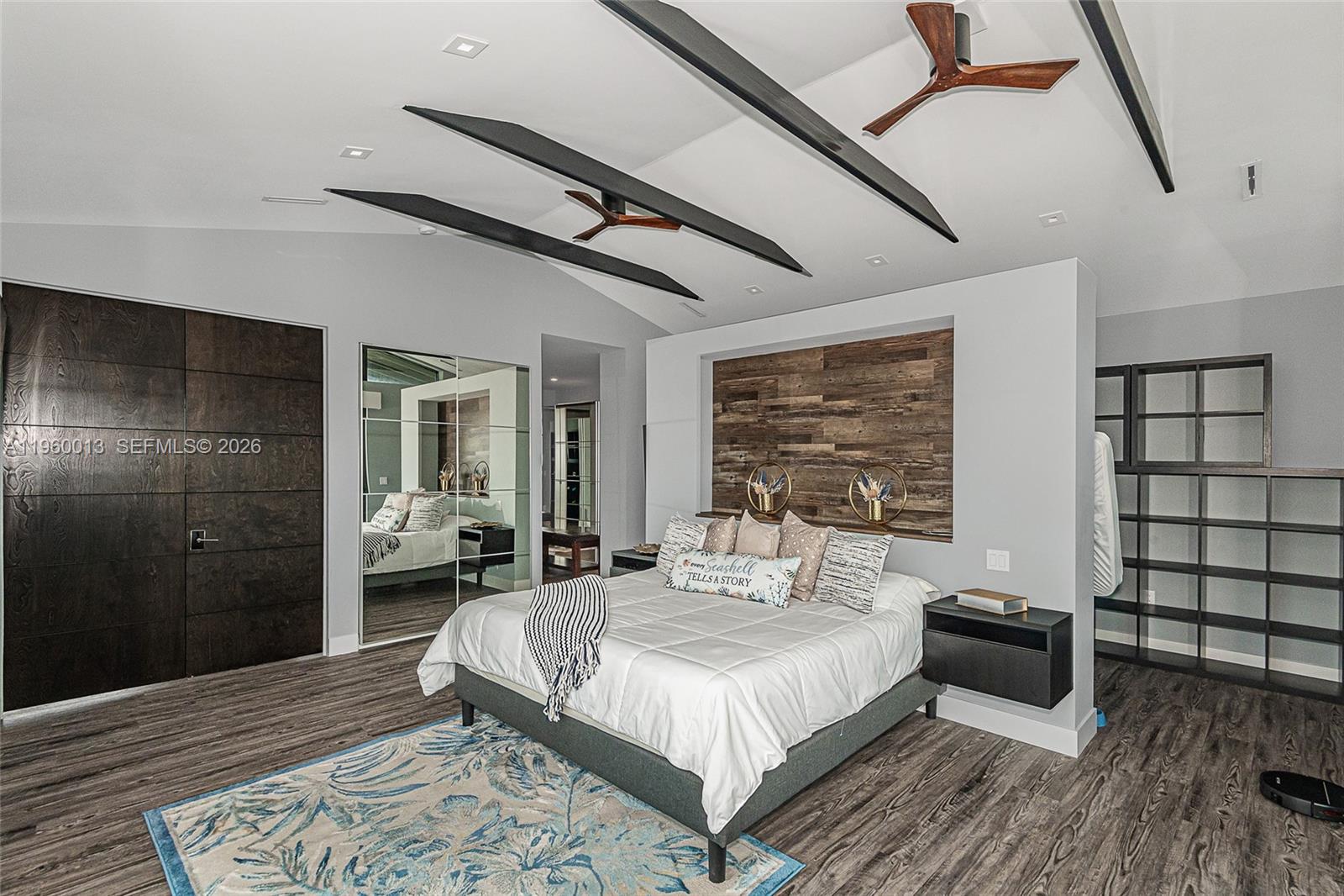 68 Mutiny Place Key Largo, FL 33037 - Photo 45 of 53 a bedroom with a bed and wooden floor