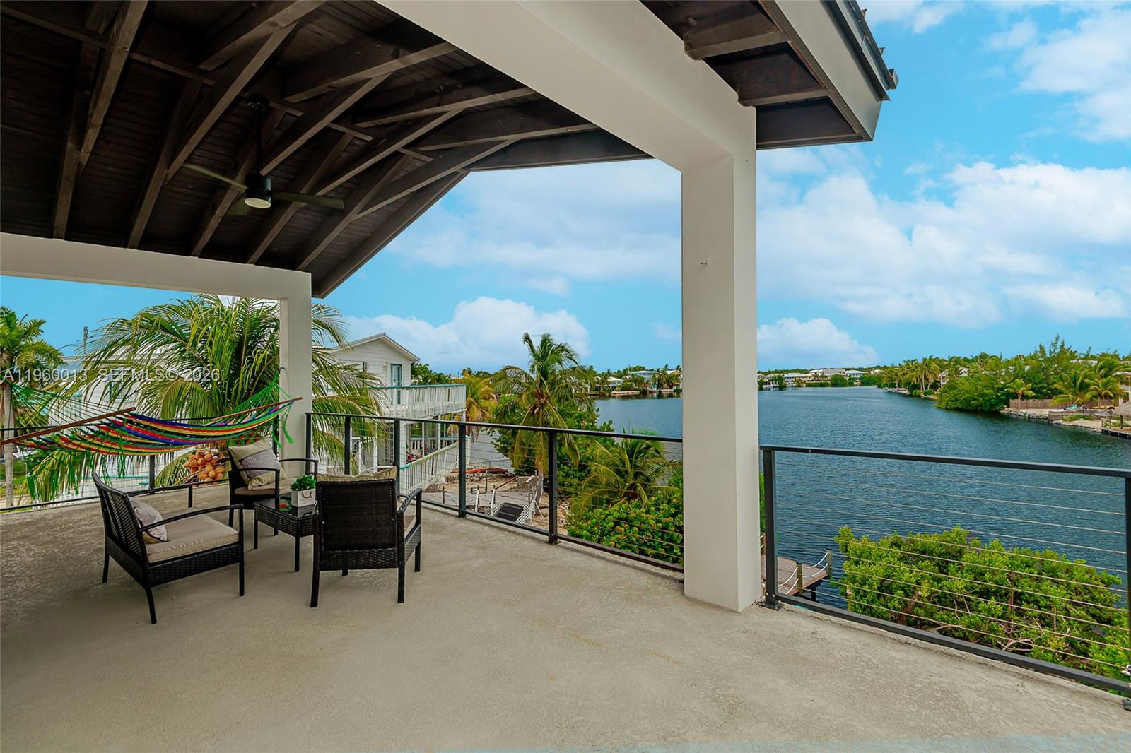 68 Mutiny Place Key Largo, FL 33037 - Photo 50 of 53 a view of chairs and table in patio