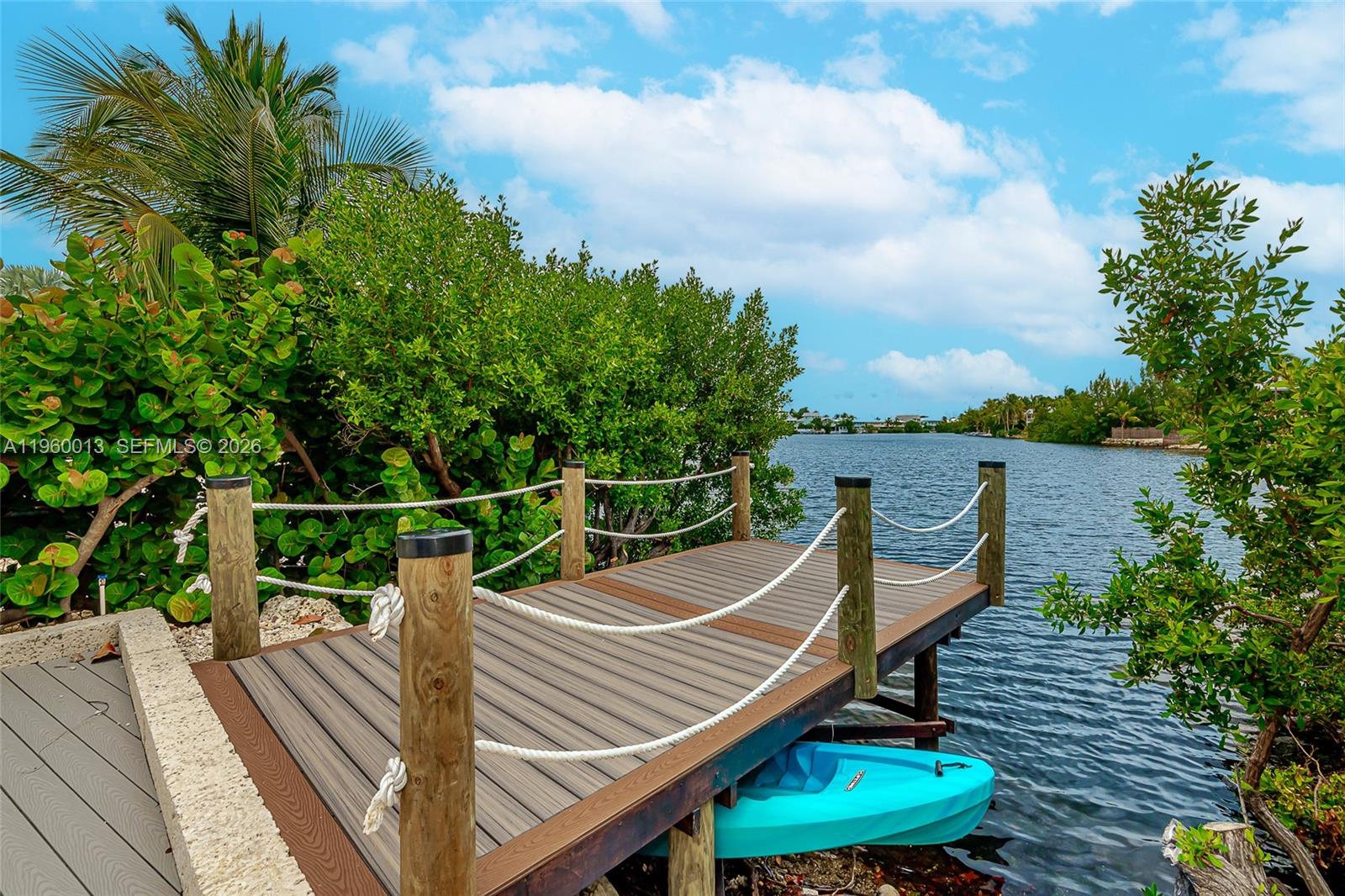 68 Mutiny Place Key Largo, FL 33037 - Photo 7 of 53 a terrace view with sitting space and garden