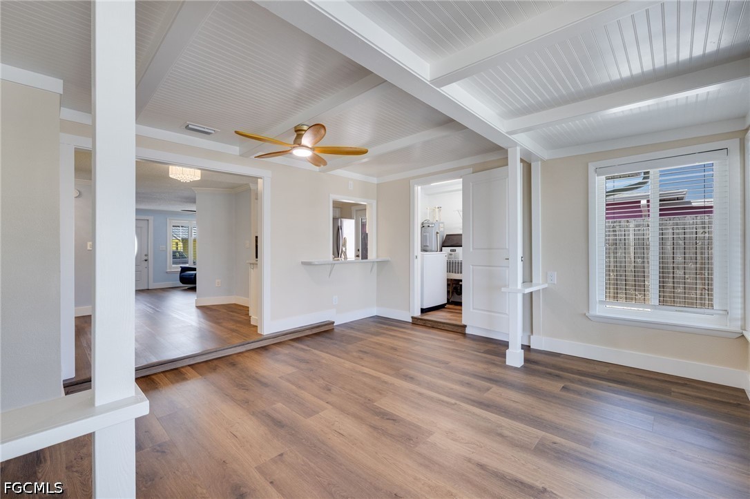 2639 Bridgeview Street Matlacha, FL 33993 - Photo 16 of 28 a view of a livingroom with wooden floor and a window