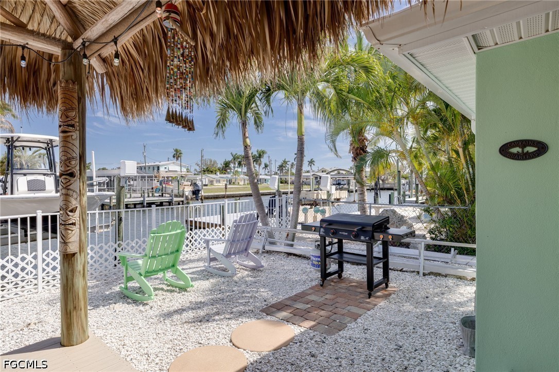 2639 Bridgeview Street Matlacha, FL 33993 - Photo 19 of 28 a view of outdoor space with seating area