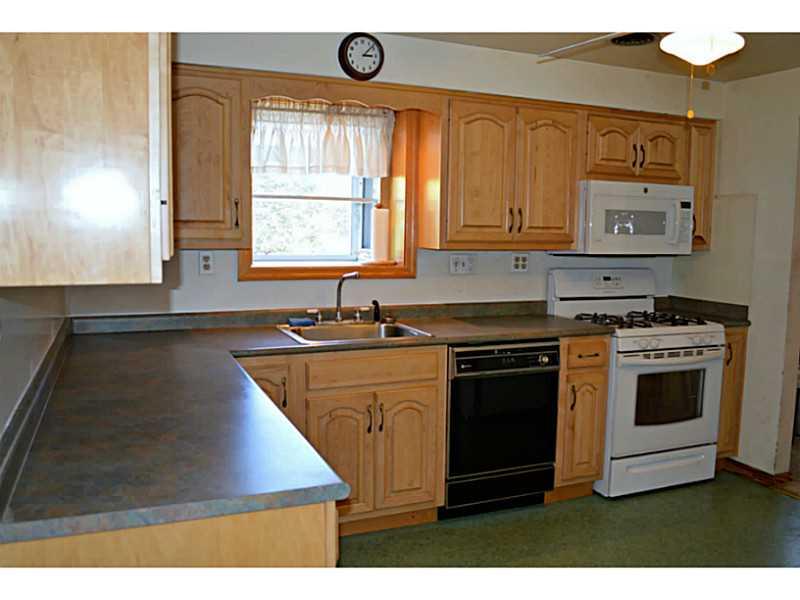 620 Wendel Road Irwin, PA 15642 - Photo 3 of 12 Kitchen. Brand new microwave, and newer stove