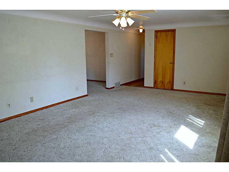 620 Wendel Road Irwin, PA 15642 - Photo 6 of 12 Family Room. Hardwood floor under the carpeting