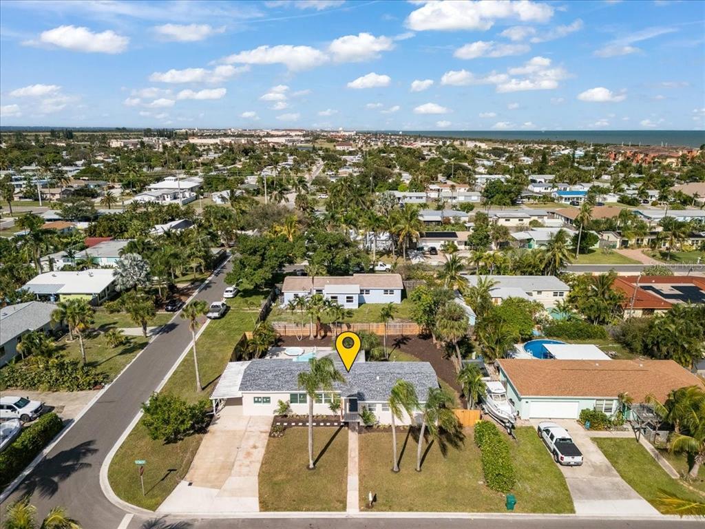 145 Southeast 3rd Street Satellite Beach, FL 32937 - Photo 27 of 29 an aerial view of residential houses with outdoor space