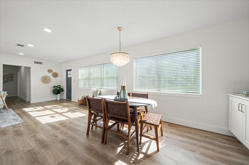 145 Southeast 3rd Street Satellite Beach, FL 32937 - Photo 8 of 29 a view of a dining room with furniture window and outside view