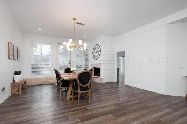 a bathroom with a sink a vanity and a mirror