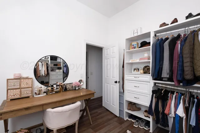 a living room with furniture and white walls