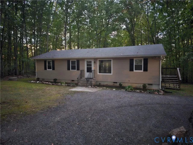 a house with trees in the background