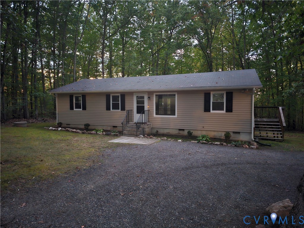 a house with trees in the background