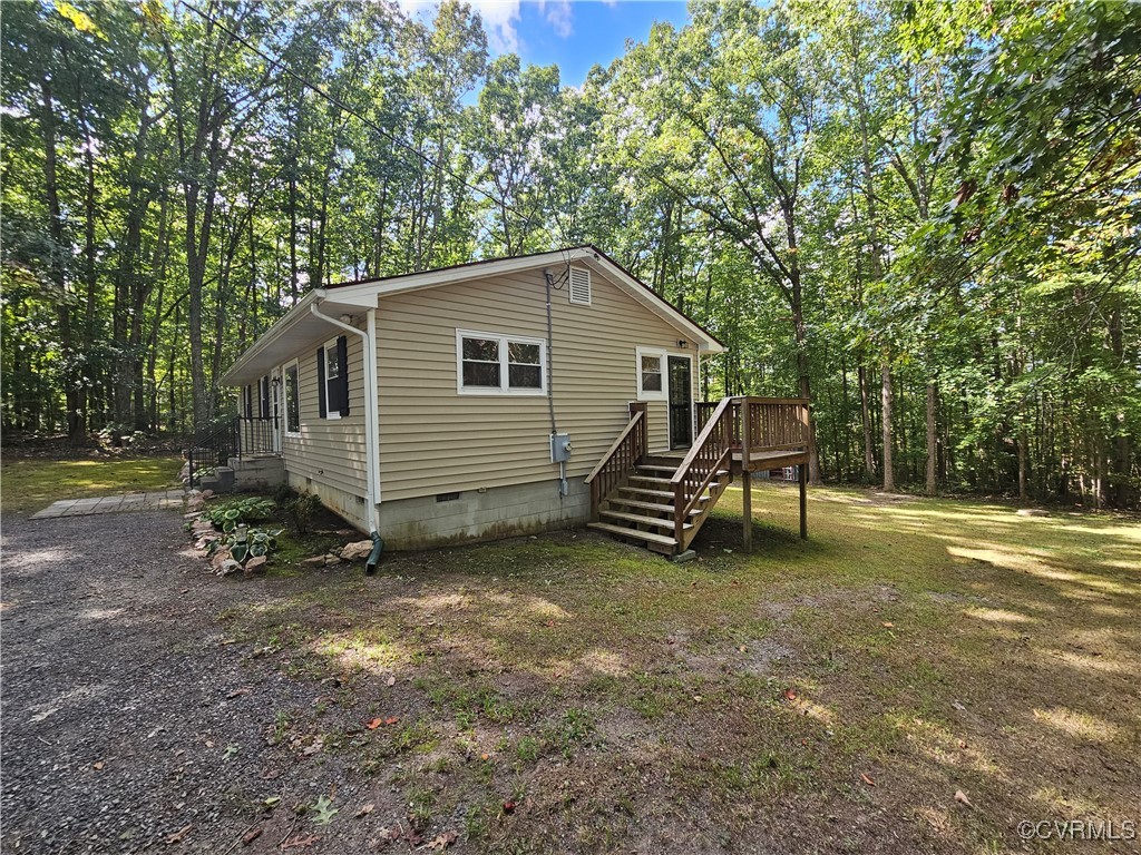 4488 Shannon Hill Road Columbia, VA 23038 - Photo 17 of 22 a view of a house with a yard