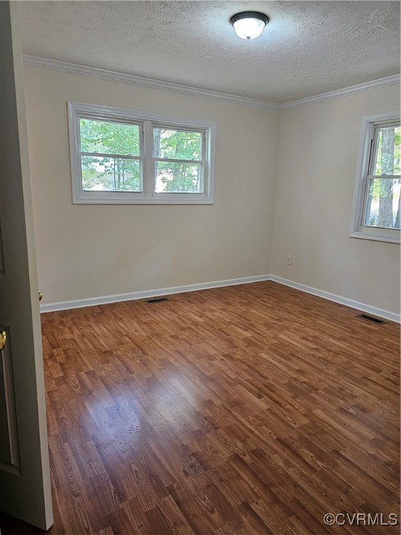 4488 Shannon Hill Road Columbia, VA 23038 - Photo 5 of 22 a view of an empty room with wooden floor and a window