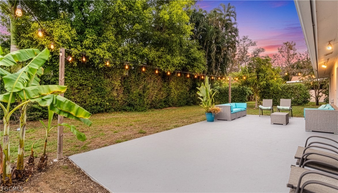 939 Bluebird Street Naples, FL 34104 - Photo 3 of 29 a view of a park with large trees