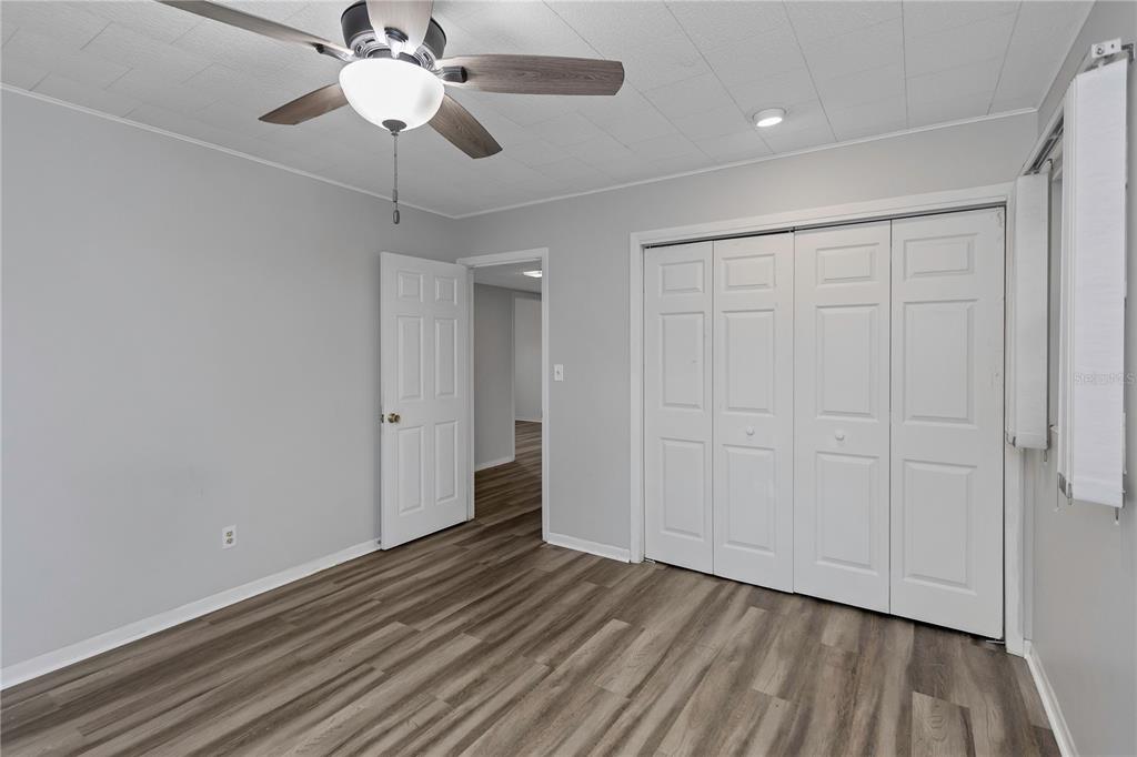 310 Terrace Drive Brandon, FL 33510 - Photo 30 of 80 a view of an empty room and wooden floor