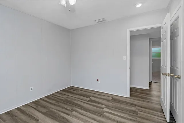 a bathroom with a sink toilet and mirror