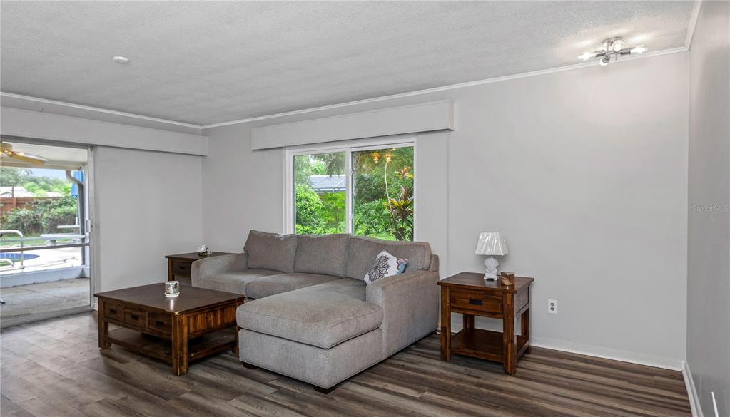 310 Terrace Drive Brandon, FL 33510 - Photo 41 of 80 a living room with furniture and a window