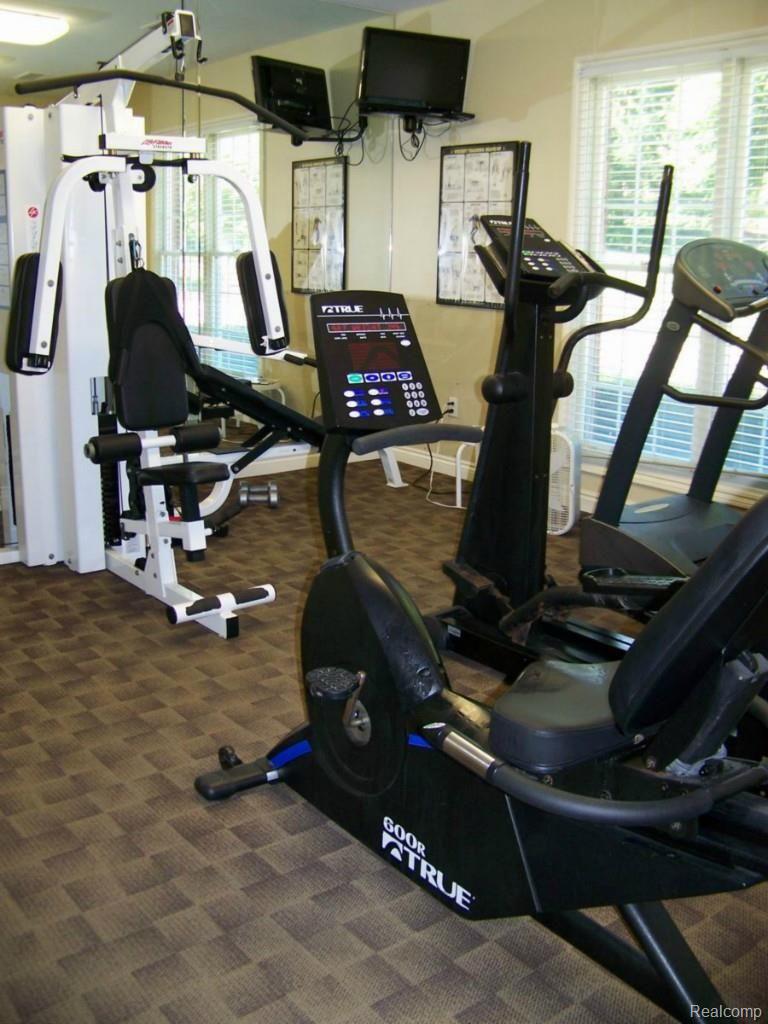 3500 Tremonte Circle, Unit 140 Rochester, MI 48306 - Photo 26 of 31 EXERCISE EQUIPMENT AT CLUBHOUSE....