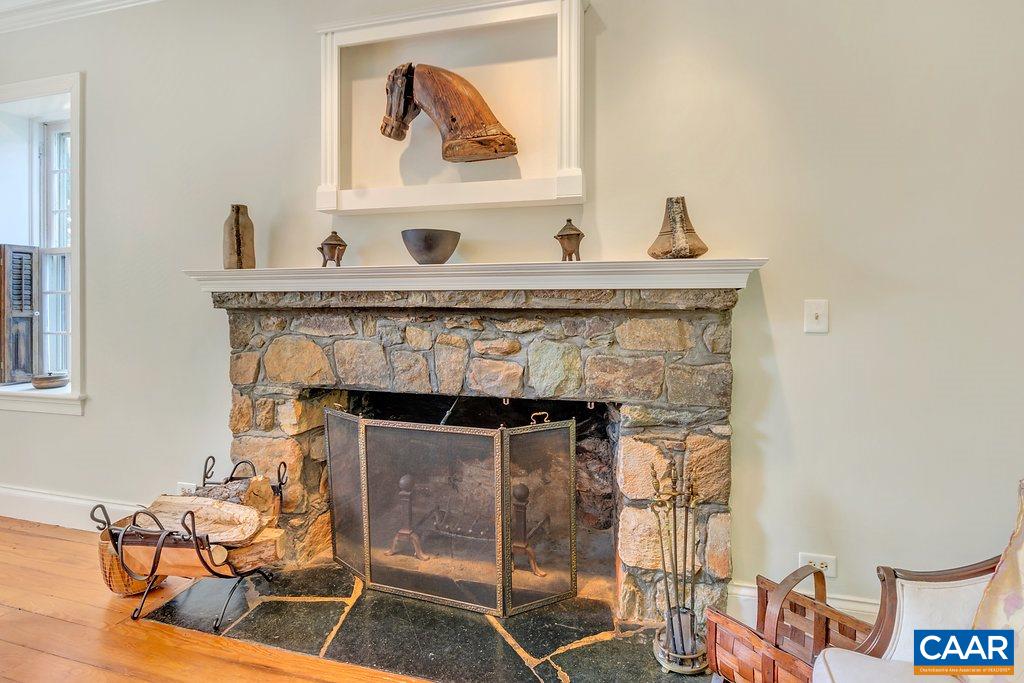 3796 Stony Point Road Charlottesville, VA 22911 - Photo 3 of 44 a living room with furniture and a fireplace
