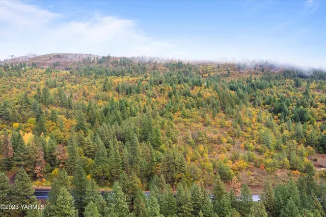 a view of a city and mountains in the background