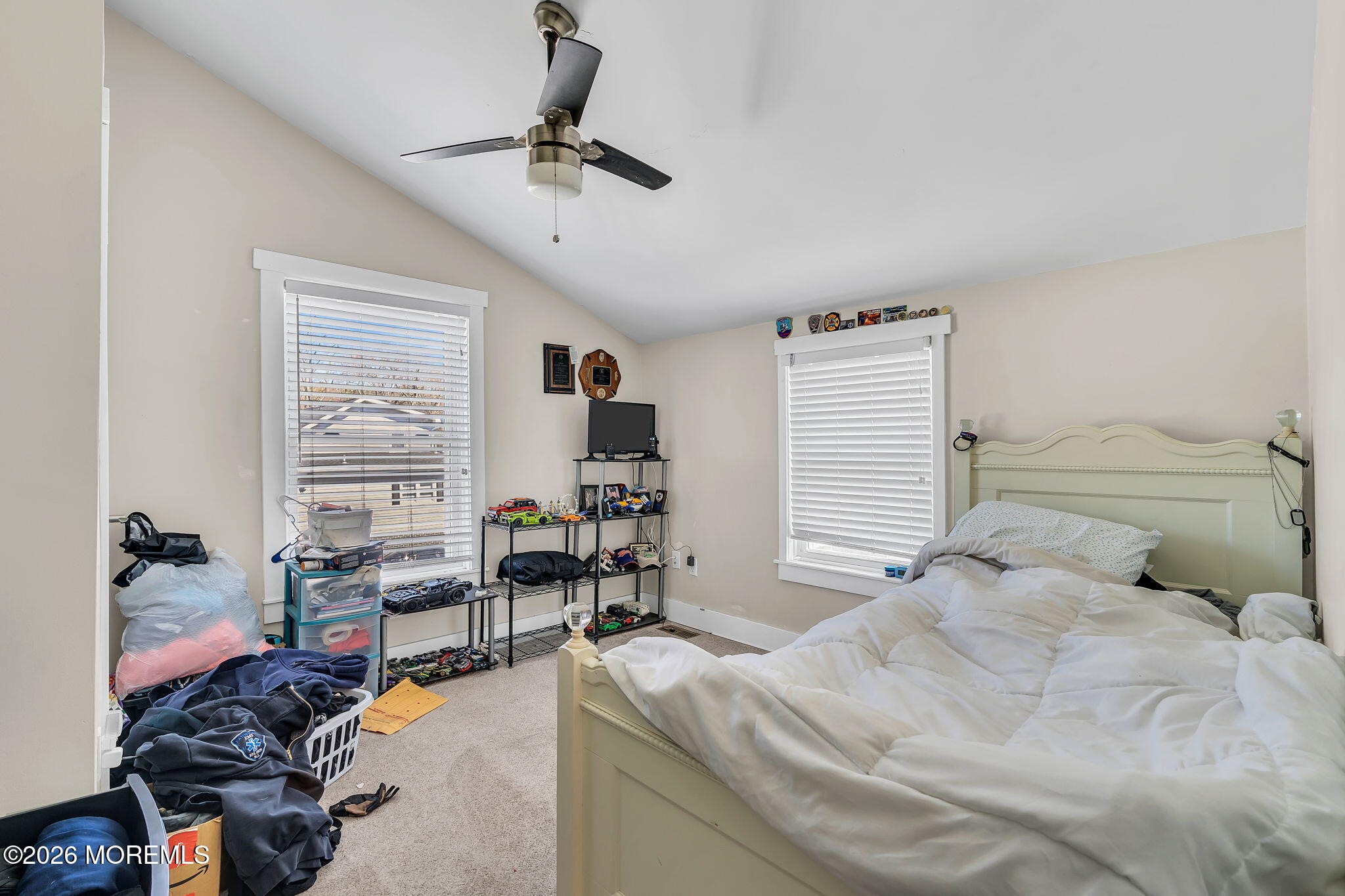 2978 Shafto Road Tinton Falls, NJ 07753 - Photo 13 of 25 a bedroom with a bed furniture and window