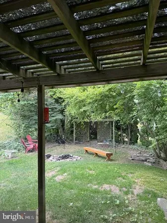 a view of outdoor space with swimming pool