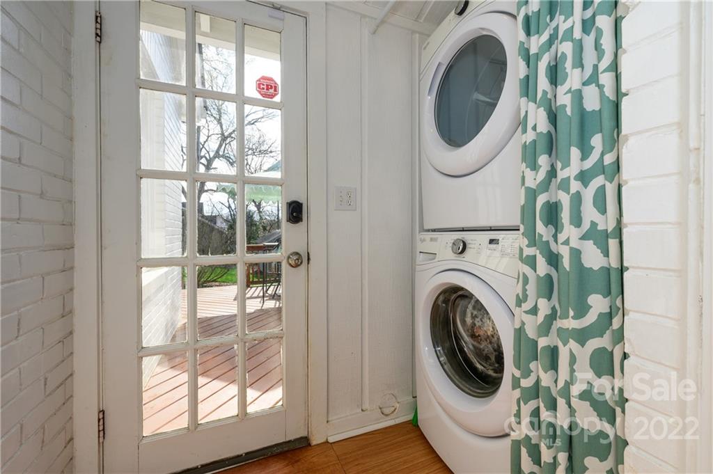 332 Marsh Road Charlotte, NC 28209 - Photo 19 of 37 a view of a hallway with washer and dryer
