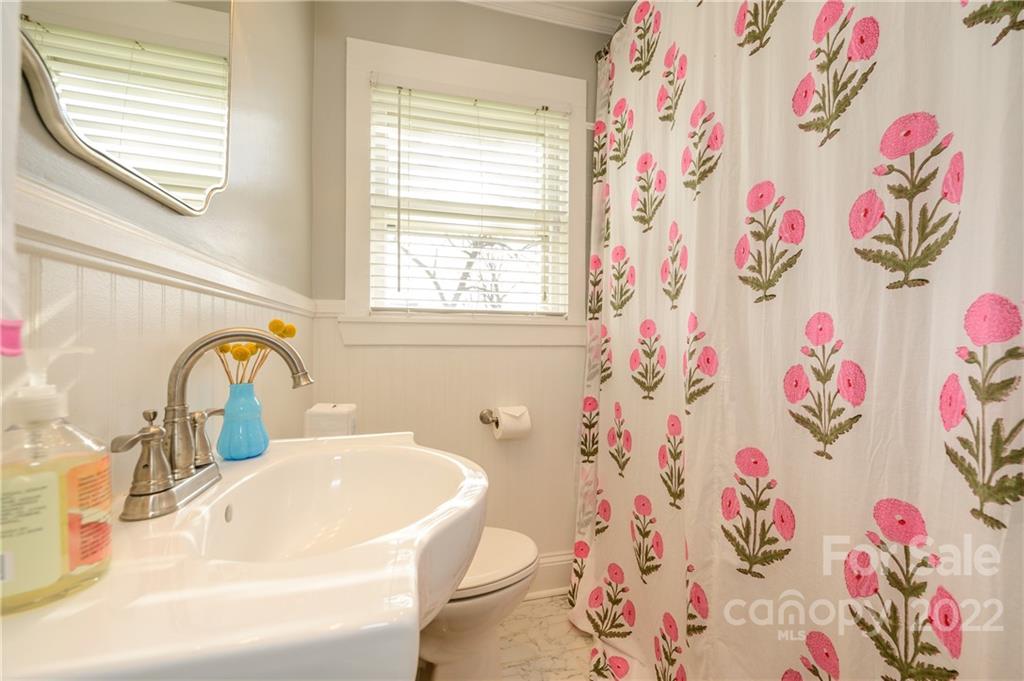 332 Marsh Road Charlotte, NC 28209 - Photo 23 of 37 a bathroom with a sink and a bath tub
