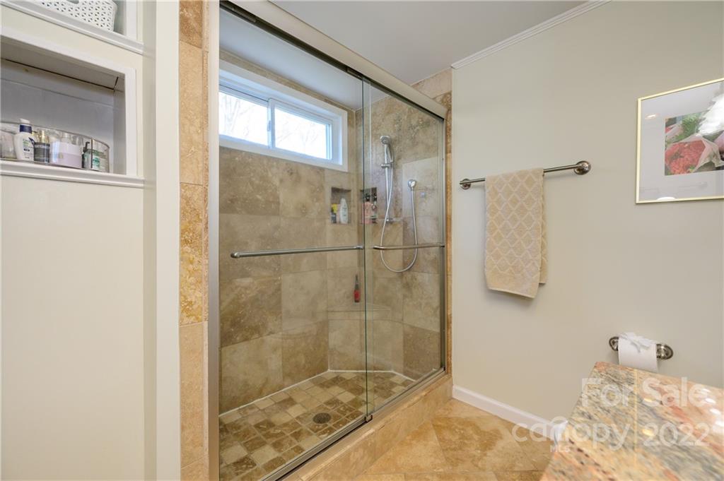 332 Marsh Road Charlotte, NC 28209 - Photo 31 of 37 a bathroom with a shower