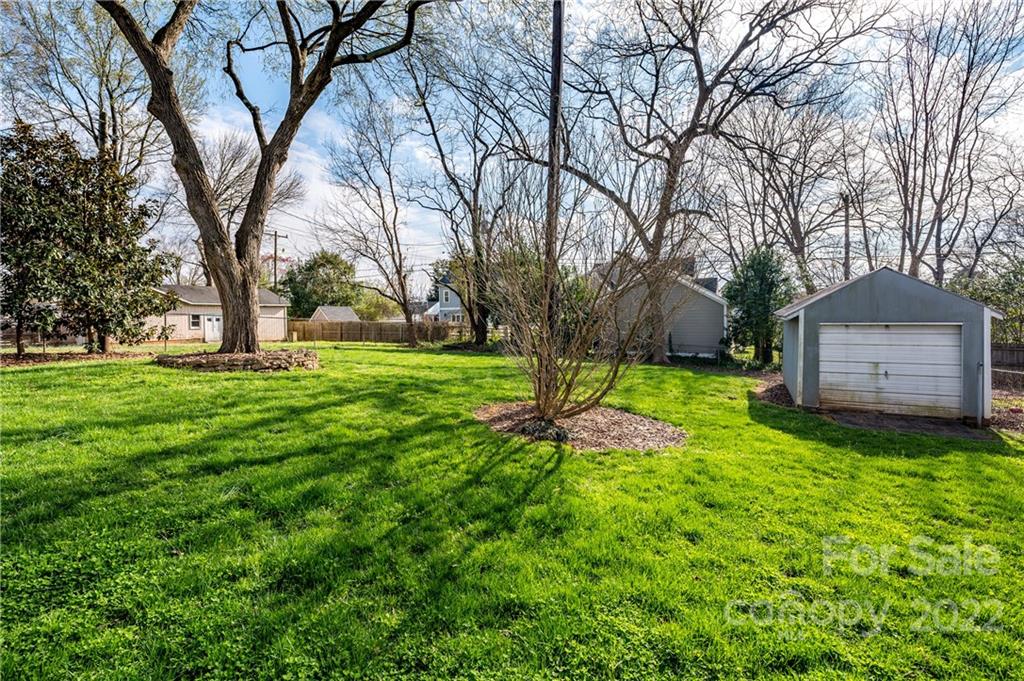 332 Marsh Road Charlotte, NC 28209 - Photo 35 of 37 a backyard of a house with lots of green space