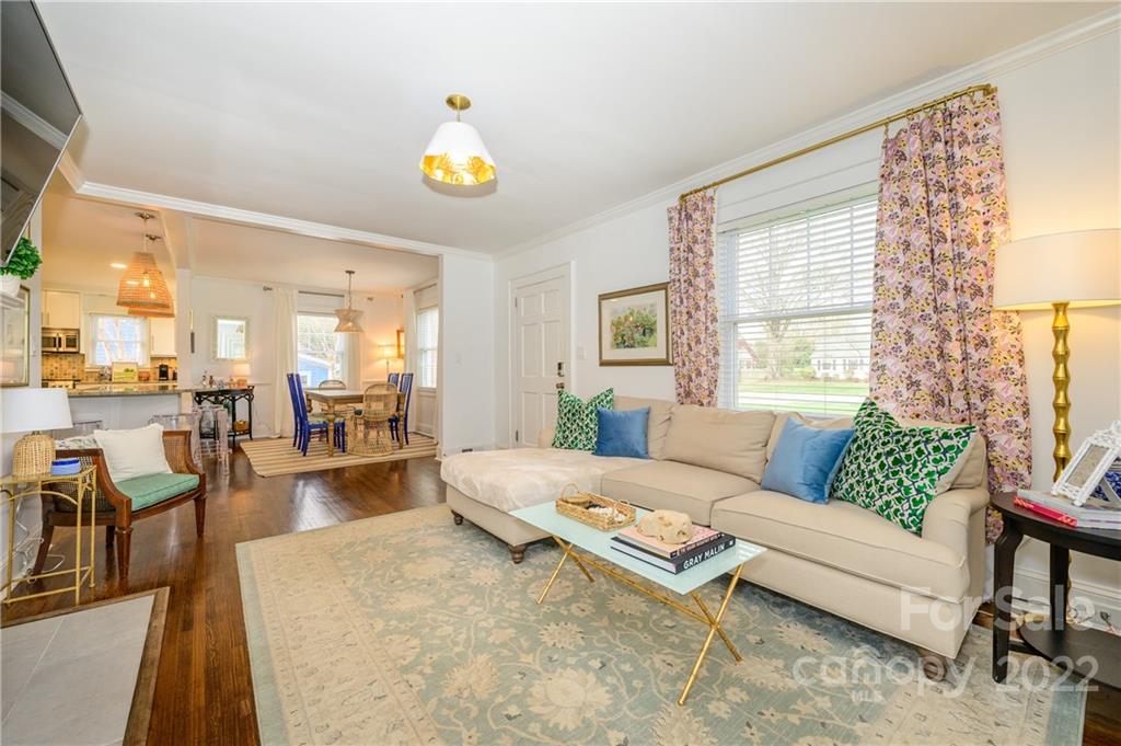 332 Marsh Road Charlotte, NC 28209 - Photo 6 of 37 a living room with furniture and a large window