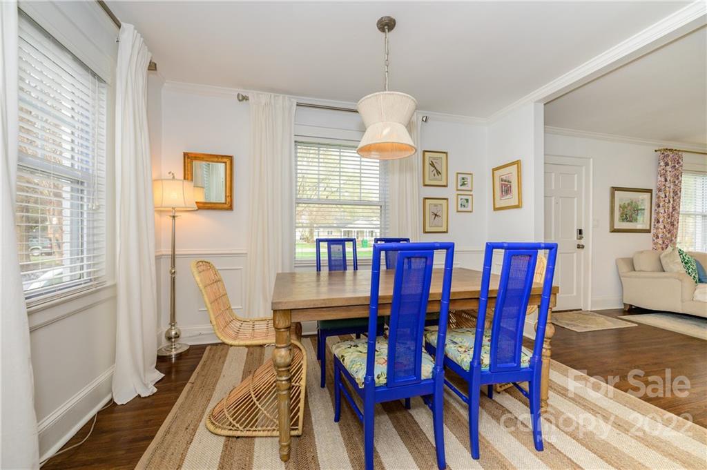332 Marsh Road Charlotte, NC 28209 - Photo 10 of 37 a view of a dining room with furniture window and wooden floor