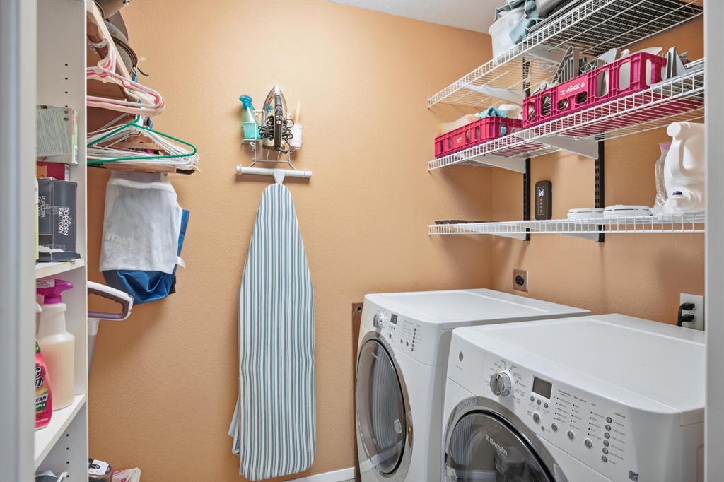 1004 Usher Street Benbrook, TX 76126 - Photo 19 of 25 a utility room with dryer and washer