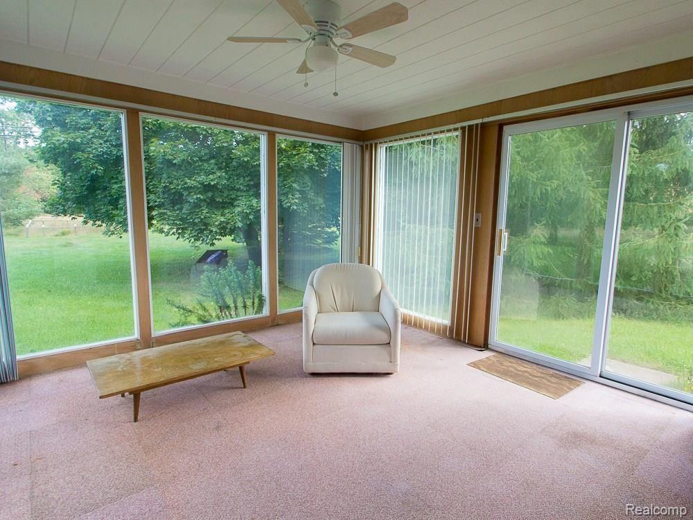 575 Sanders Road Oxford, MI 48371 - Photo 10 of 22 Sun Room Provides Shaded Options
