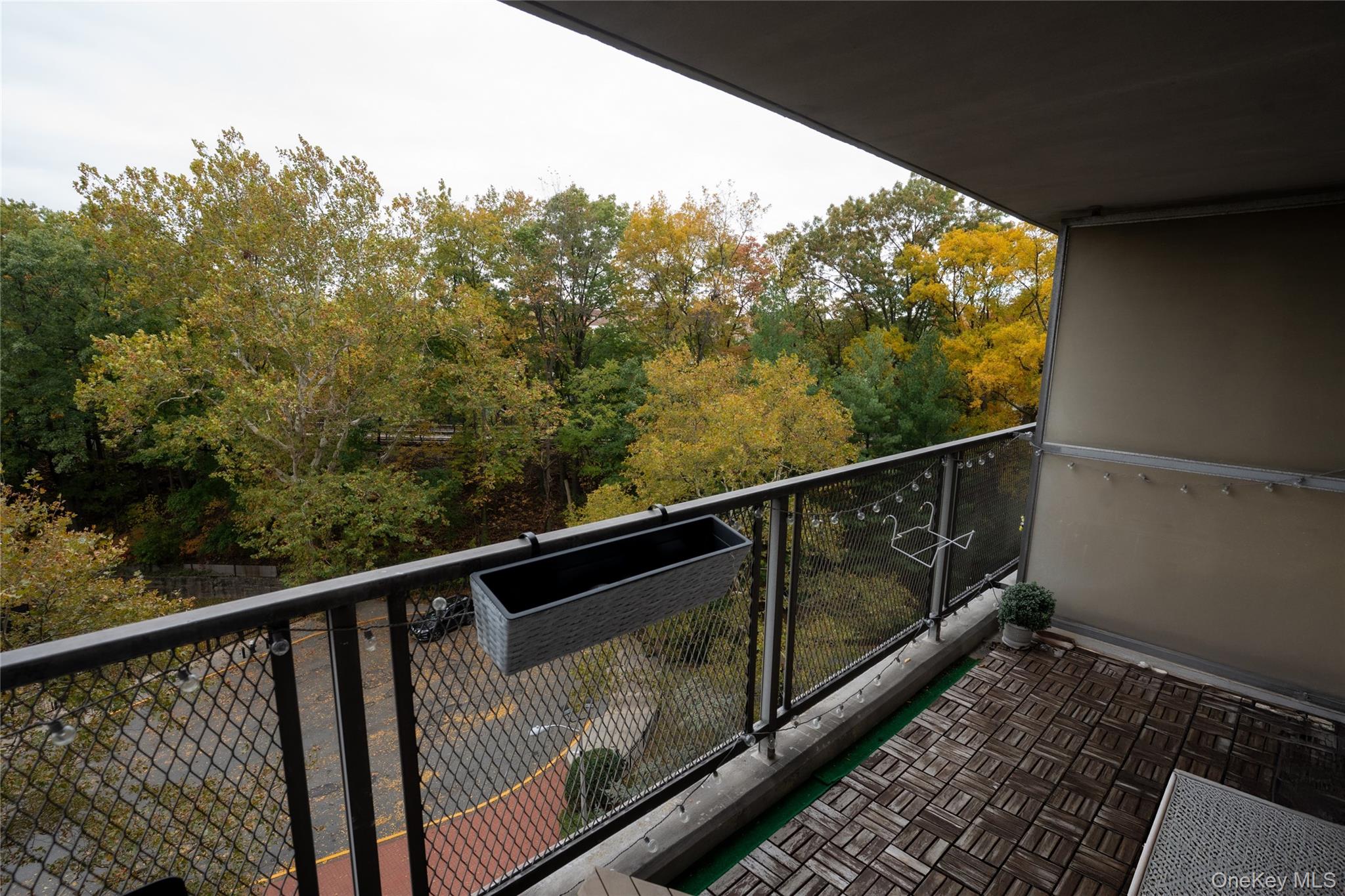3410 De Reimer Avenue, Unit 7F Bronx, NY 10475 - Photo 11 of 23 a view of balcony with wooden floor
