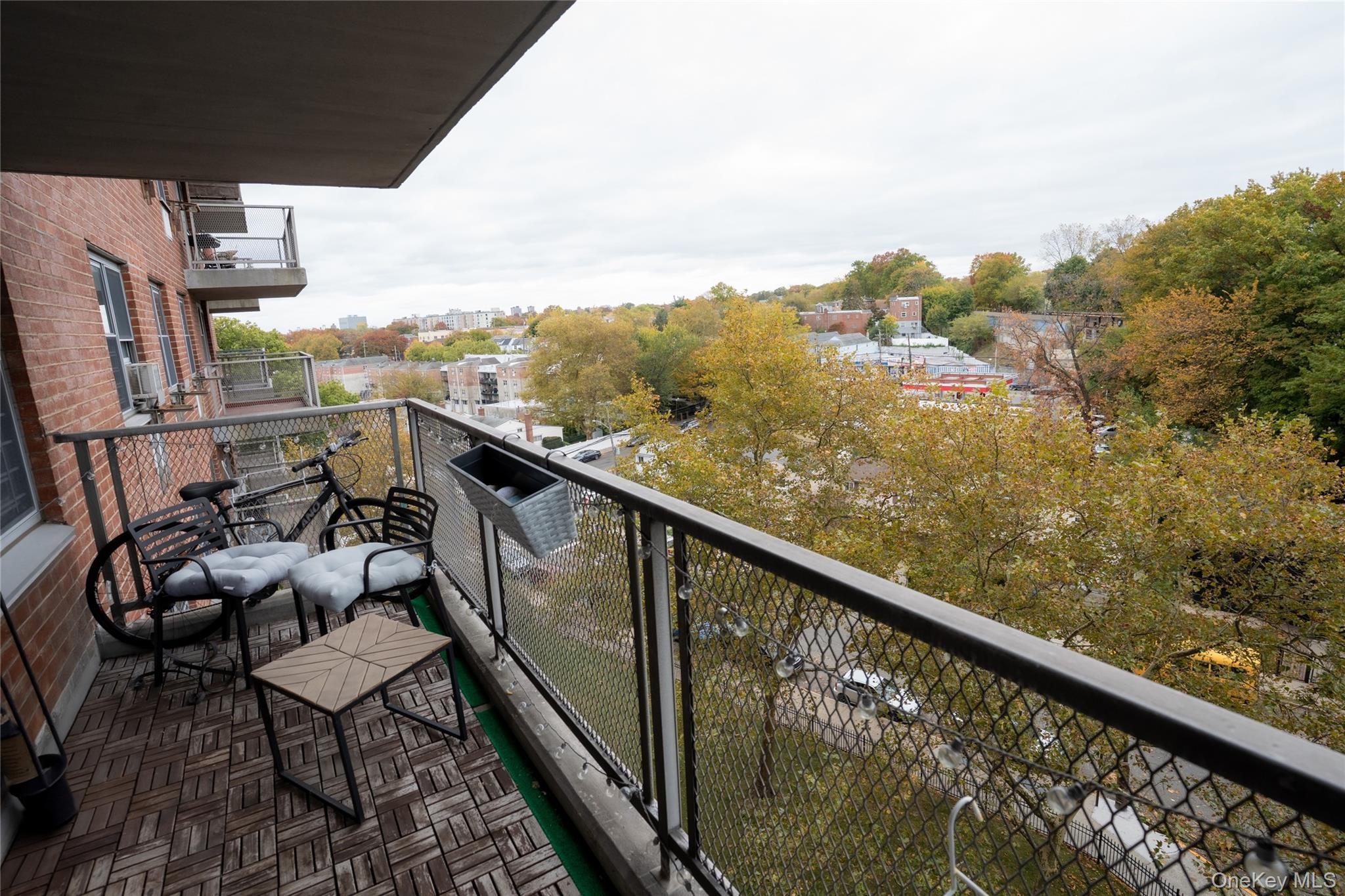 3410 De Reimer Avenue, Unit 7F Bronx, NY 10475 - Photo 12 of 23 a view of a balcony with chairs