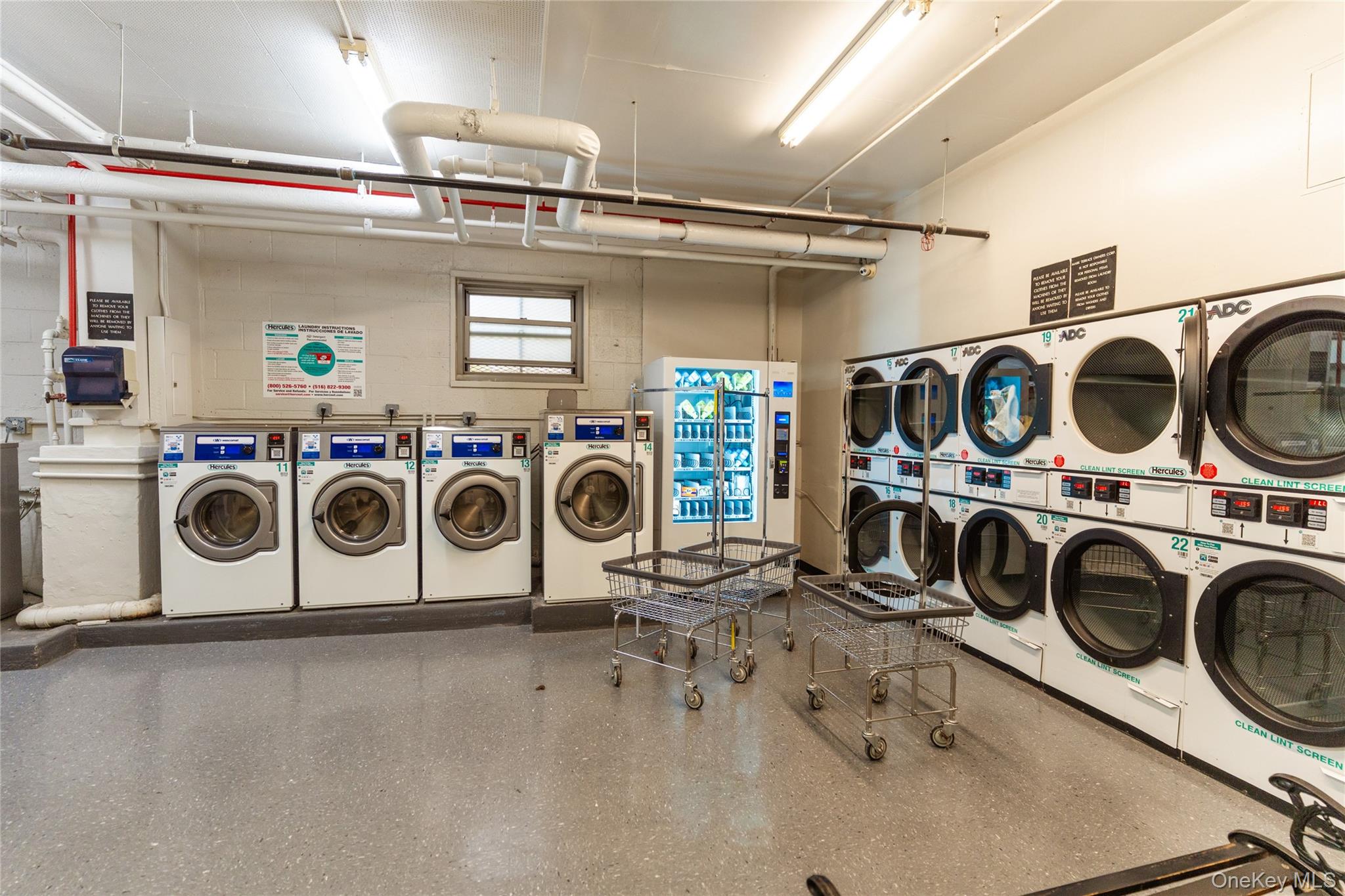 3410 De Reimer Avenue, Unit 7F Bronx, NY 10475 - Photo 13 of 23 a utility room with dryer washer and dryer