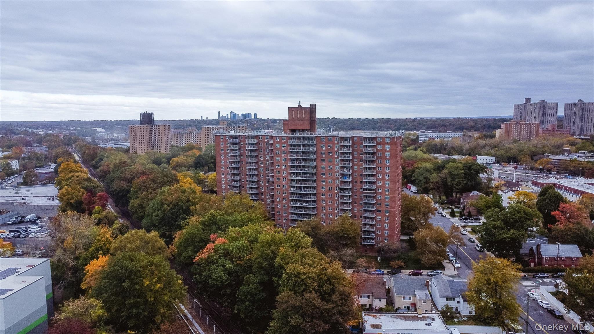 3410 De Reimer Avenue, Unit 7F Bronx, NY 10475 - Photo 22 of 23 a view of a city with tall buildings in the background