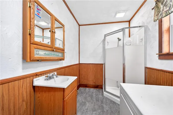 a bathroom with a sink a toilet and a bathtub