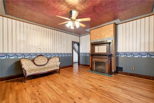 a kitchen with stainless steel appliances granite countertop a refrigerator a stove and a sink
